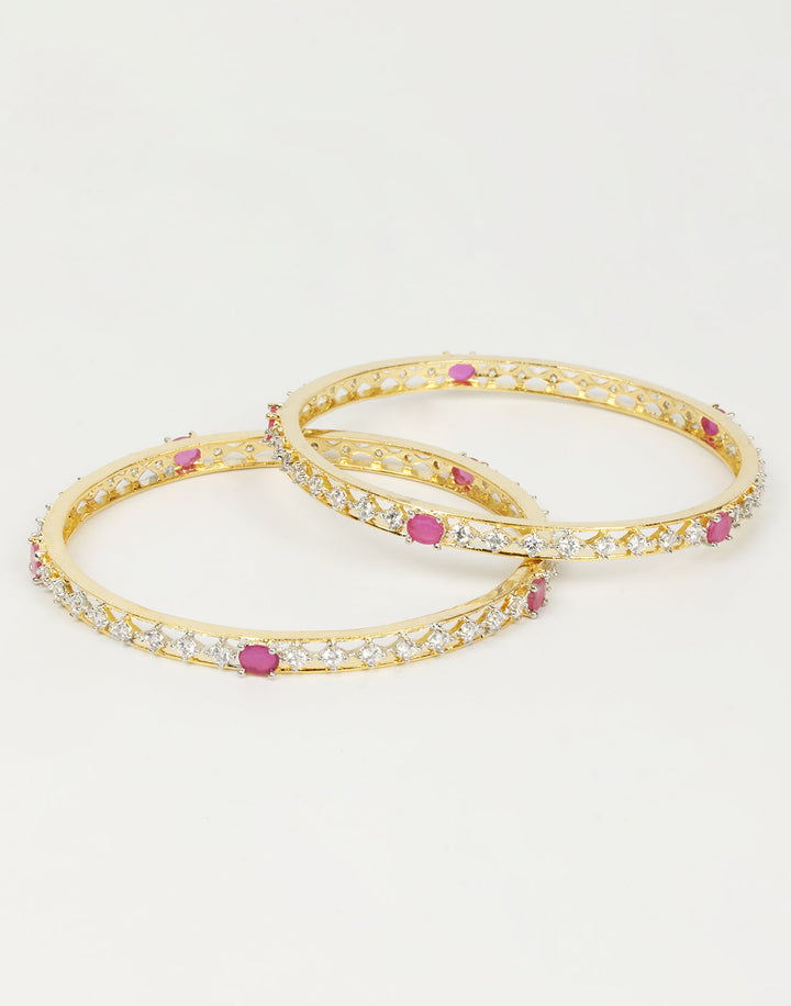 Gold And Diamond Bangles With Red Colored Stones