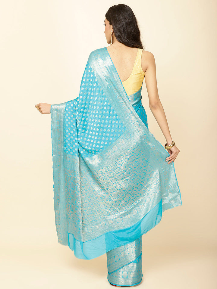Zari Border Booti Plain Crepe Saree