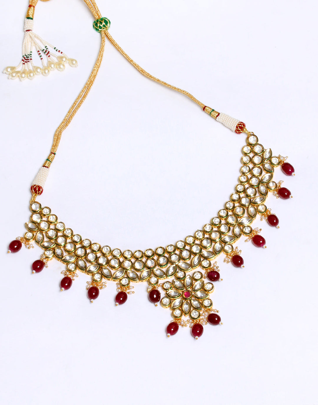 Elegant Gold Toned Kundan Set With Ruby Stone