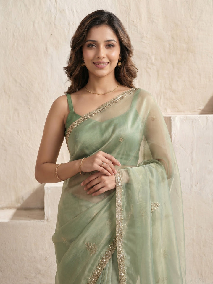 Pista Green Embroidered Tissue Saree