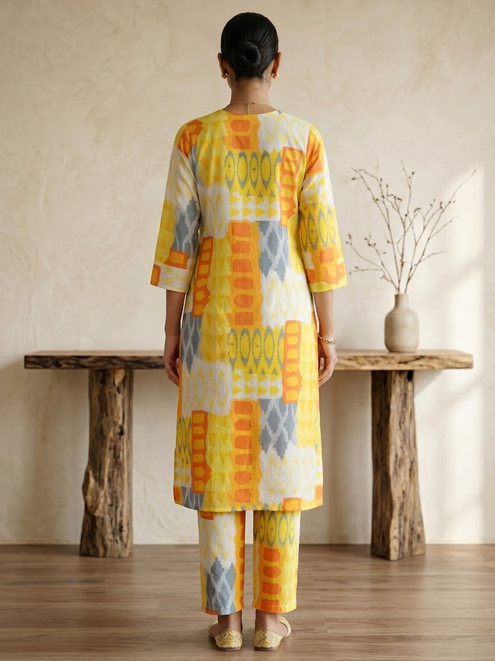 Yellow Printed Cotton Blend V Neck Straight Kurta With Pant