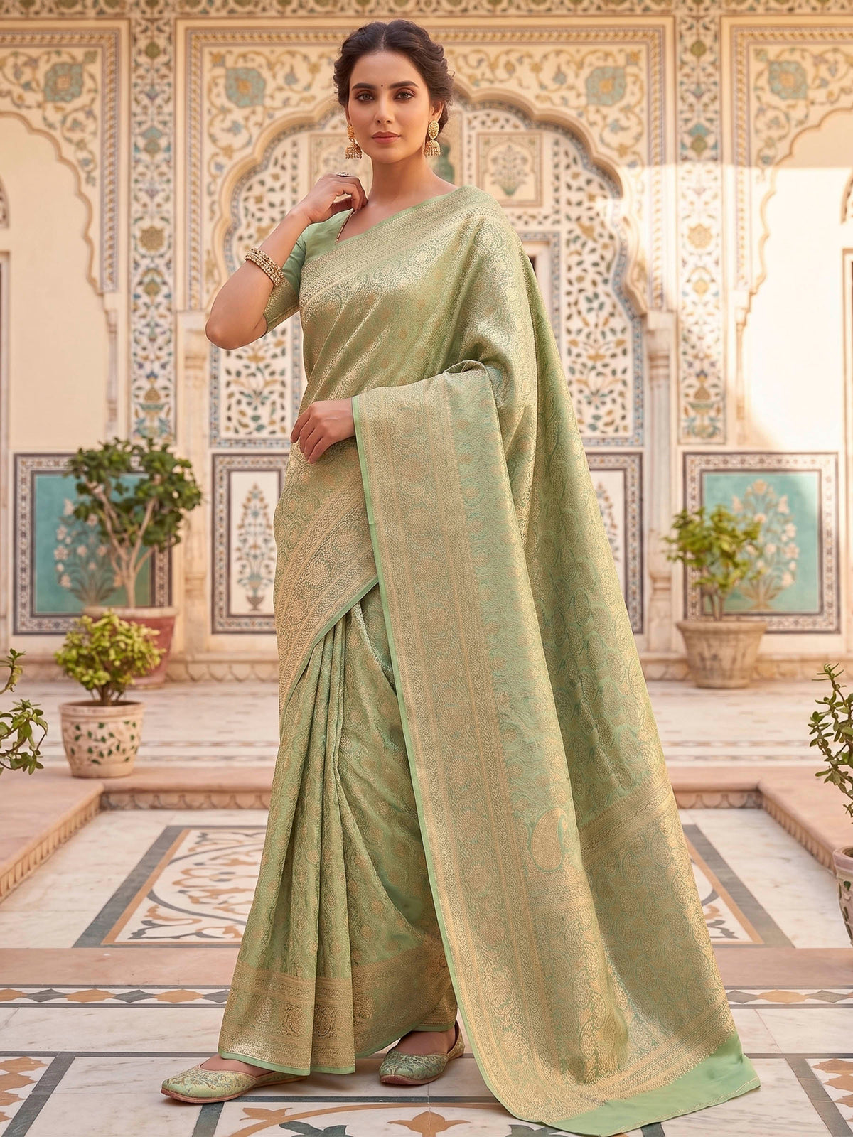 Pista Green Woven Design Art Silk Kanjivaram Saree