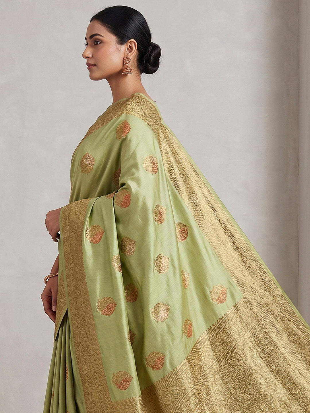 Pista Green Woven Design Dola Silk Saree
