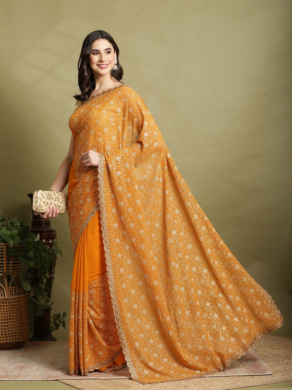 Orange Embroidered Georgette Saree
