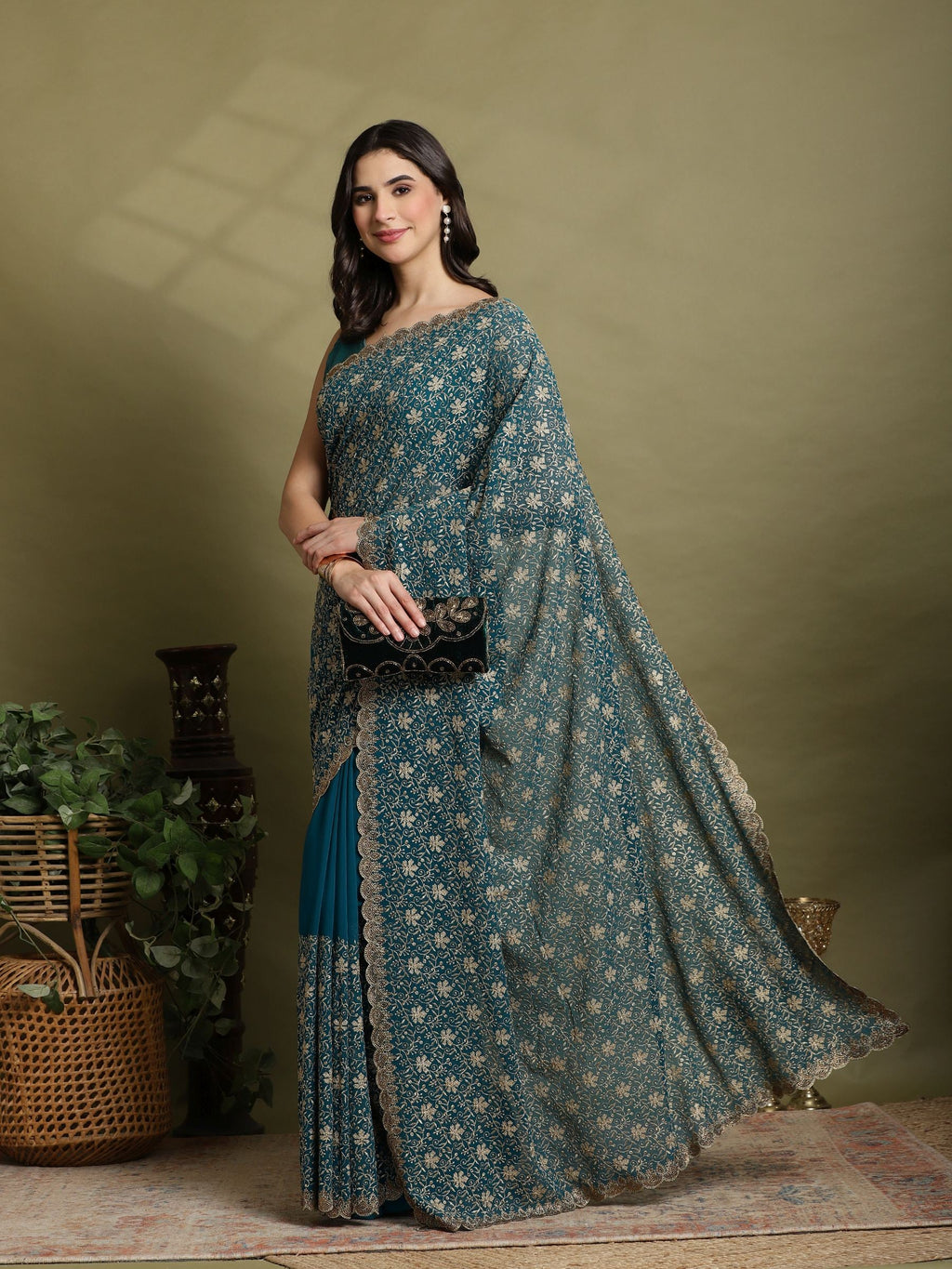Teal Green Embroidered Georgette Saree