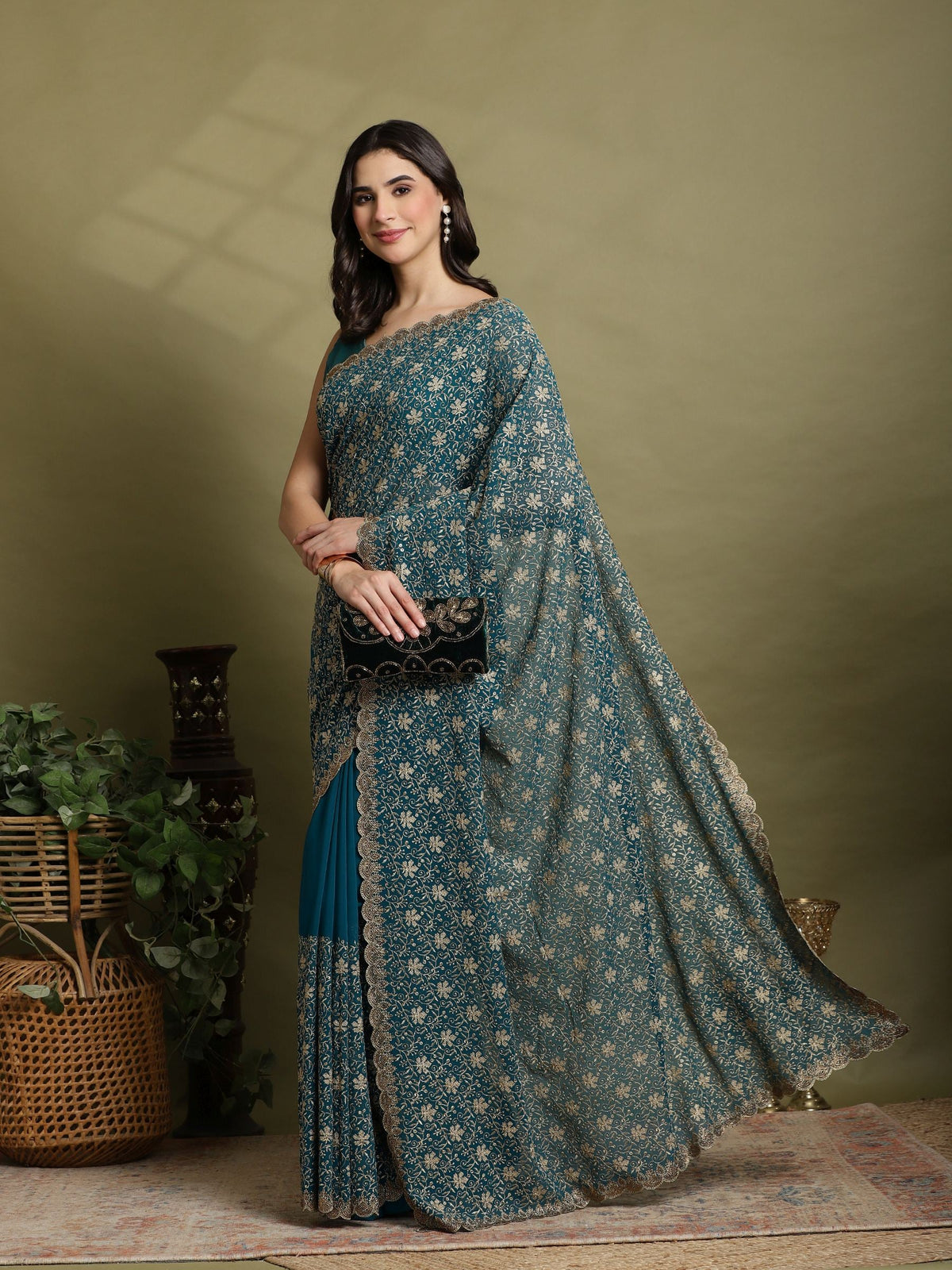 Teal Green Embroidered Georgette Saree
